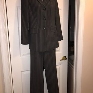Grey pinstriped two piece suit size 8 Petite